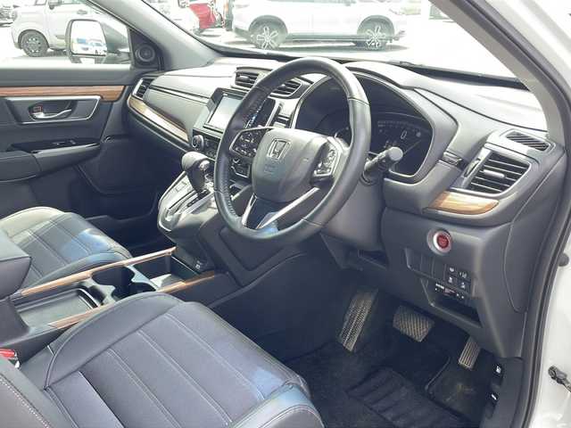 ホンダ ＣＲ－Ｖ EX 道東・釧路十勝 2022(令4)年 0.8万km プラチナホワイトパール ・４WD/・純正SDメモリナビ/（ＳＤ・ＣＤ・ＤＶＤ・フルセグ・ＡＭ・ＦＭ・ＢＴ）/・バックカメラ/・レーダークルーズコントロール/・純正エンジンスターター/・ホンダセンシング/・ステアリングヒーター/・革巻きステアリング/・パドルシフト/・横滑り防止装置/・レーンキープアシスト/・運転席パワーシート/・メモリーシート/・前席シートヒーター/・ヒーテッドドアミラー/・電動格納ミラー/・ドアバイザー/・純正フロアマット/・スマートキー/・プッシュスタート/・ブラインドスポットモニター/・社外アルミホイール付冬タイヤ積込