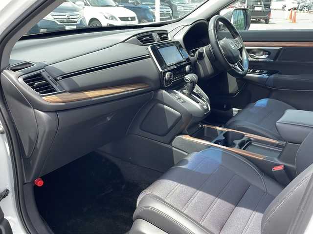 ホンダ ＣＲ－Ｖ EX 道東・釧路十勝 2022(令4)年 0.8万km プラチナホワイトパール ・４WD/・純正SDメモリナビ/（ＳＤ・ＣＤ・ＤＶＤ・フルセグ・ＡＭ・ＦＭ・ＢＴ）/・バックカメラ/・レーダークルーズコントロール/・純正エンジンスターター/・ホンダセンシング/・ステアリングヒーター/・革巻きステアリング/・パドルシフト/・横滑り防止装置/・レーンキープアシスト/・運転席パワーシート/・メモリーシート/・前席シートヒーター/・ヒーテッドドアミラー/・電動格納ミラー/・ドアバイザー/・純正フロアマット/・スマートキー/・プッシュスタート/・ブラインドスポットモニター/・社外アルミホイール付冬タイヤ積込