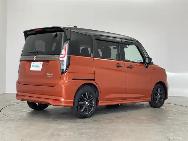スズキ ソリオ HV SZ 埼玉県 2023(令5)年 1.9万km フレイムオレンジパールM / ガンメタリック2トーン 純正９インチナビ　全方位モニター　ヘッドアップディスプレイ　ビルトインＥＴＣ　前後ドラレコ　シートヒーター　レーダークルーズコントロール　パドルシフト　両側パワースライドドア　ＬＥＤ　オートライト