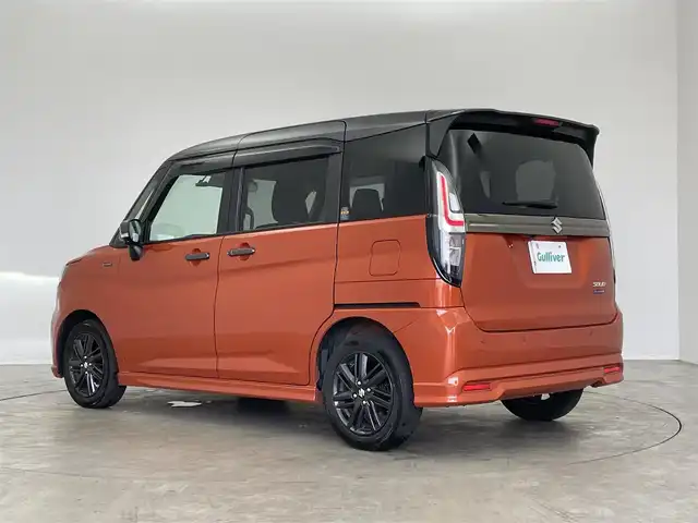 スズキ ソリオ HV SZ 埼玉県 2023(令5)年 1.9万km フレイムオレンジパールM / ガンメタリック2トーン 純正９インチナビ　全方位モニター　ヘッドアップディスプレイ　ビルトインＥＴＣ　前後ドラレコ　シートヒーター　レーダークルーズコントロール　パドルシフト　両側パワースライドドア　ＬＥＤ　オートライト