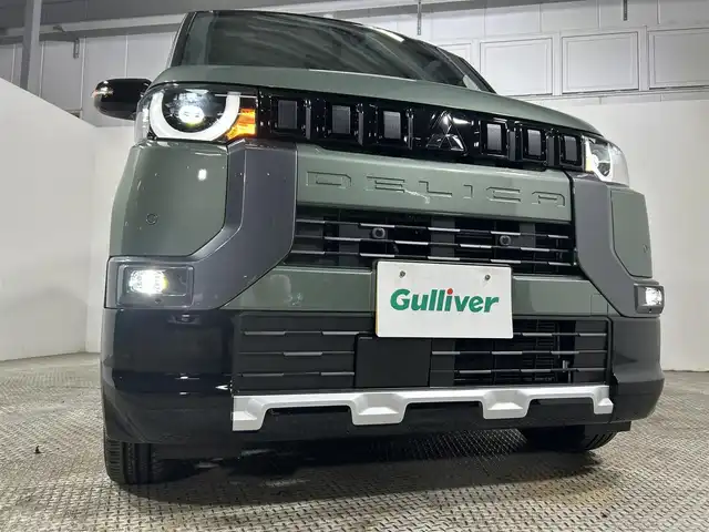 三菱 デリカミニ T プレミアム 大阪府 2025(令7)年 0.1千km Ｄグリーン 未使用車　ディスプレイオーディオ　全方位カメラ　ハーフレザー　ターボ　ダウンヒルアシスト　ルーフレール　シートヒーター　ハンドルヒーター　レーダークルコン　衝突軽減　レーンアシスト　スマートキー