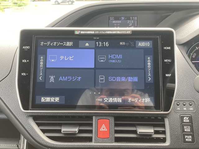トヨタ エスクァイア ハイブリッド Gi プレミアムパッケージ ブラックテーラード 佐賀県 2021(令3)年 4万km ホワイトパールクリスタルシャイン ワンオーナー/純正10.5インチナビ/バックカメラ/両側パワースライドドア/プリクラッシュセーフティ/レーンディパーチャーアラート/オートハイビーム/クルーズコントロール/クリアランスソナー/ハーフレザーシート/シートヒーター/ステアリングヒーター/AC100V/ステアリングリモコン/ETC2.0/プッシュスタート/スマートキー/LEDヘッドライト/フォグライト/純正アルミホイール