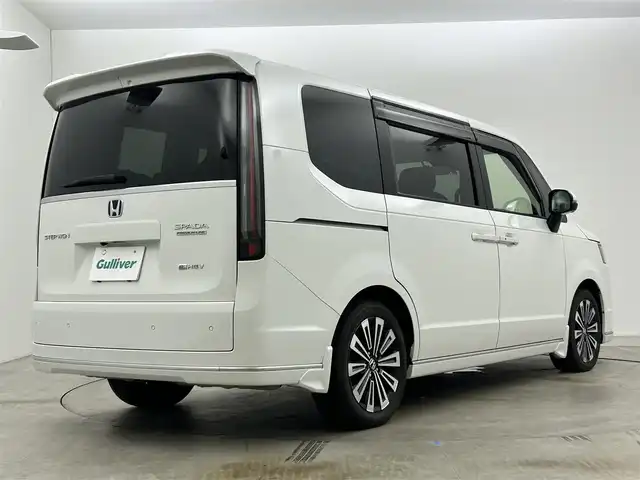 ホンダ ステップワゴン スパーダ eHEV プレミアムライン 岡山県 2023(令5)年 1.1万km プラチナホワイトパール 純正11.4インチナビ/地デジ/Bluetooth/DVD/CD/SD/Carplay/全方位カメラ/純正10インチフリップダウンモニター/両側パワースライドドア/ハーフレザーシート /シートヒーター /LEDヘッドライト/コーナーセンサー /パワーバックドア /ホンダセンシング /アダプティブクルーズコントロール/ビルトインETC2.0/純正前後ドライブレコーダー /オットマン/パドルシフト/スマートキー/スペアキー×１