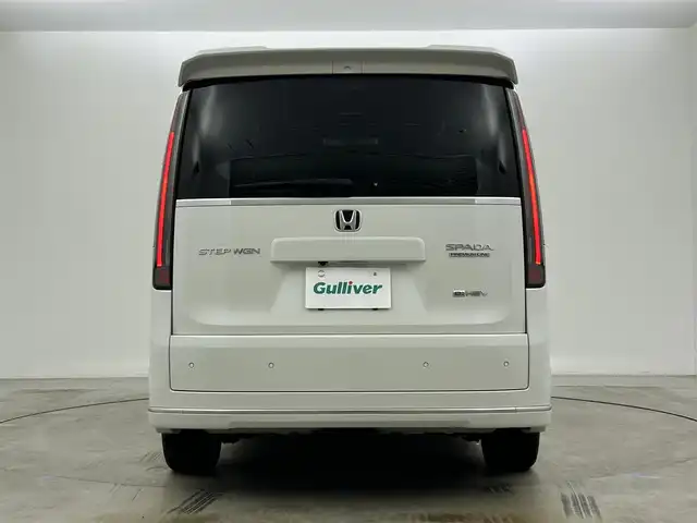 ホンダ ステップワゴン スパーダ eHEV プレミアムライン 岡山県 2023(令5)年 1.1万km プラチナホワイトパール 純正11.4インチナビ/地デジ/Bluetooth/DVD/CD/SD/Carplay/全方位カメラ/純正10インチフリップダウンモニター/両側パワースライドドア/ハーフレザーシート /シートヒーター /LEDヘッドライト/コーナーセンサー /パワーバックドア /ホンダセンシング /アダプティブクルーズコントロール/ビルトインETC2.0/純正前後ドライブレコーダー /オットマン/パドルシフト/スマートキー/スペアキー×１