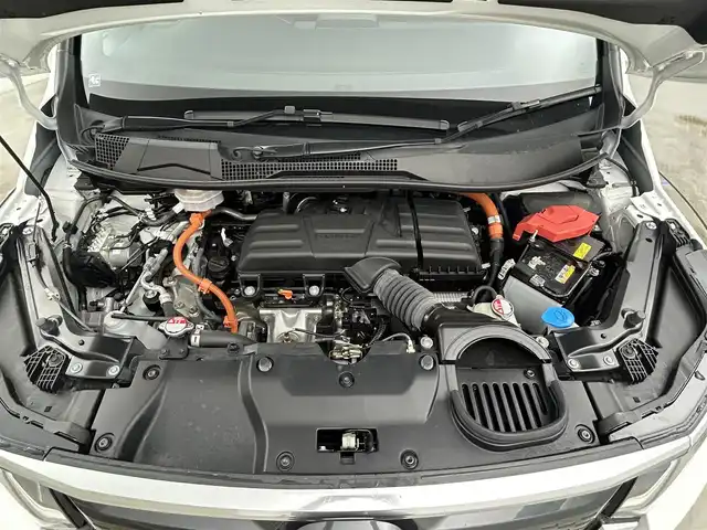 ホンダ ステップワゴン スパーダ eHEV プレミアムライン 岡山県 2023(令5)年 1.1万km プラチナホワイトパール 純正11.4インチナビ/地デジ/Bluetooth/DVD/CD/SD/Carplay/全方位カメラ/純正10インチフリップダウンモニター/両側パワースライドドア/ハーフレザーシート /シートヒーター /LEDヘッドライト/コーナーセンサー /パワーバックドア /ホンダセンシング /アダプティブクルーズコントロール/ビルトインETC2.0/純正前後ドライブレコーダー /オットマン/パドルシフト/スマートキー/スペアキー×１