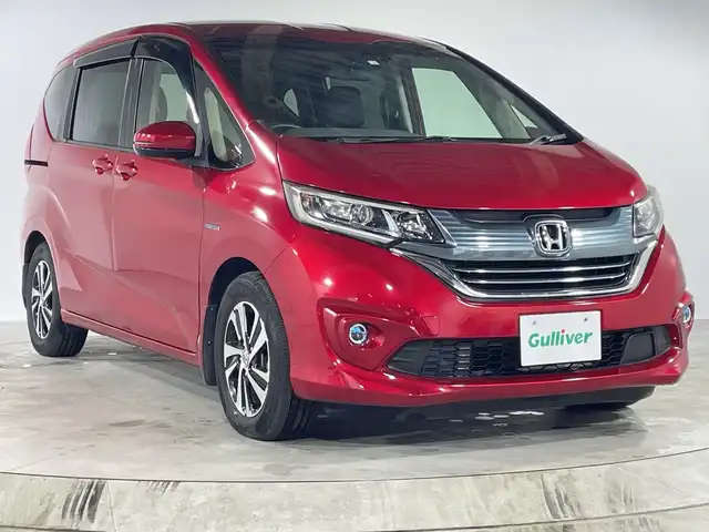 ホンダ フリード ハイブリット EX 福岡県 2018(平30)年 6.8万km プレミアムクリスタルレッドM 純正ナビ9型/（CD/DVD/AM/FM/Ipad）/フルセグ/バックカメラ/ビルトインETC/ホンダセンシング/D/Nシートヒーター/ハーフレザーシート/クルーズコントロール/コーナーセンサー/両側パワースライド/純正AW15インチ/純正フロアマット/スマートキー/プッシュスタート