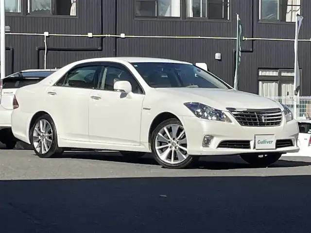 トヨタ クラウン ハイブリッド Lパッケージ 宮城県 2010(平22)年 12.7万km ホワイトパールクリスタルシャイン 純正メモリーナビ/（ＡＭ／ＦＭ／ＣＤ／ＤＶＤ）　/フルセグテレビ　/クルーズコントロール　/横滑り防止装置　/前席パワーシート　/スマートキー　/プッシュスタート　/ＥＴＣ