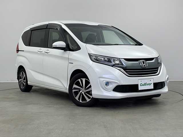 ホンダ フリード ハイブリット G ホンダセンシング 新潟県 2018(平30)年 5.8万km ホワイトオーキッドパール ナビ/（CD/DVD/SD/Bluetooth/フルセグテレビ）/バックカメラ/両側パワースライドドア/プッシュスタート/ホンダセンシング/レーダークルーズコントロール/レーンキープアシスト/先行車発信警報/オートライト/LEDライト/フォグライト/ETC/前方ドライブレコーダー/スマートキー/プッシュスタート/スペアキー/取扱説明書/保証書