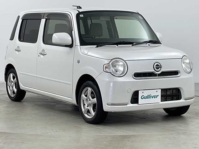 ダイハツ ミラ ココア X 道央・札幌 2013(平25)年 3.8万km パールホワイトⅢ ・4WD/・社外ナビ　TV＆DVD＆CD/・バックカメラ/・エコアイドル/・スマートキー/・電動格納ドアミラー/・ドアミラーヒーター/・オートエアコン/・社外14インチアルミホイール/・社外13インチアルミ付冬タイヤ積込