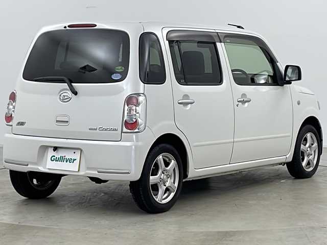 ダイハツ ミラ ココア X 道央・札幌 2013(平25)年 3.8万km パールホワイトⅢ ・4WD/・社外ナビ　TV＆DVD＆CD/・バックカメラ/・エコアイドル/・スマートキー/・電動格納ドアミラー/・ドアミラーヒーター/・オートエアコン/・社外14インチアルミホイール/・社外13インチアルミ付冬タイヤ積込