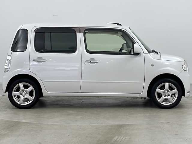 ダイハツ ミラ ココア X 道央・札幌 2013(平25)年 3.8万km パールホワイトⅢ ・4WD/・社外ナビ　TV＆DVD＆CD/・バックカメラ/・エコアイドル/・スマートキー/・電動格納ドアミラー/・ドアミラーヒーター/・オートエアコン/・社外14インチアルミホイール/・社外13インチアルミ付冬タイヤ積込