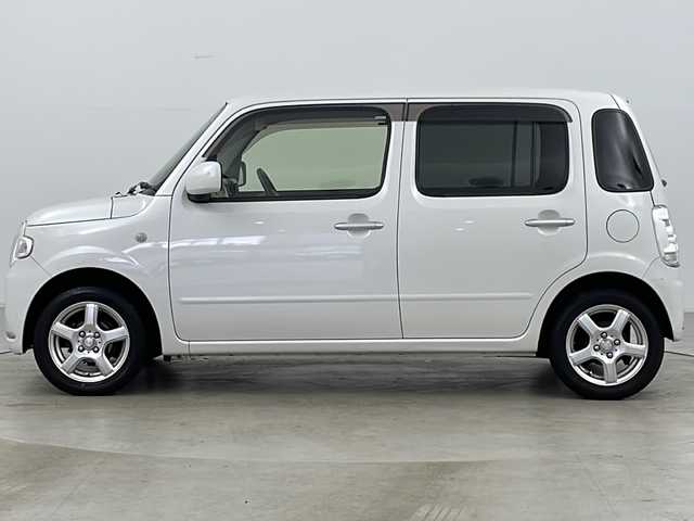 ダイハツ ミラ ココア X 道央・札幌 2013(平25)年 3.8万km パールホワイトⅢ ・4WD/・社外ナビ　TV＆DVD＆CD/・バックカメラ/・エコアイドル/・スマートキー/・電動格納ドアミラー/・ドアミラーヒーター/・オートエアコン/・社外14インチアルミホイール/・社外13インチアルミ付冬タイヤ積込