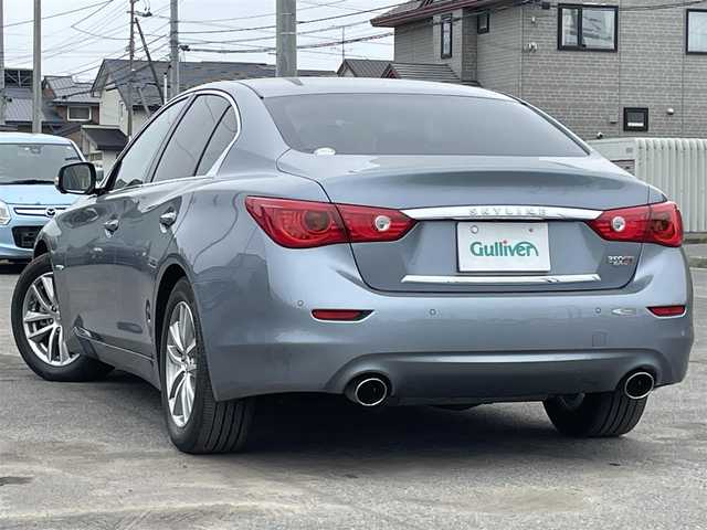 日産 スカイライン ハイブリッド 350GT FOUR Type P 道央・札幌 2014(平26)年 9.9万km ハガネブルーM ４WD/ワンオーナー/純正メーカーナビ/CD/DVD/BT/フルセグ/エマージェンシーブレーキ/横滑り防止装置/レーダークルーズコントロール/クリアランスソナー/アラウンドビューモニター/ビルトインETC/EVMODE/DRIVEMODE切替/前席パワーシート/前席シートヒーター/D席メモリーシート/レザーシート/革巻きステアリング/ステアリングリモコン/MTモード付AT/プッシュスタート/スマートキー/LEDヘッドライト/オートライト/フォグランプ/電動格納ミラー/ウィンカーミラー/純正フロアマット