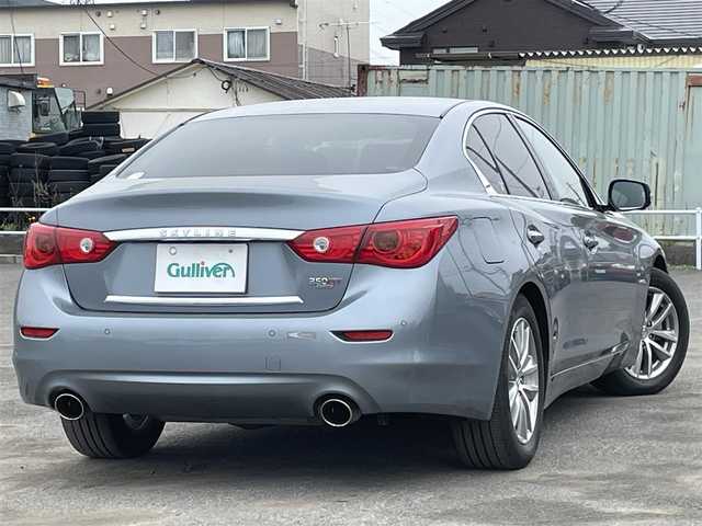 日産 スカイライン ハイブリッド 350GT FOUR Type P 道央・札幌 2014(平26)年 9.9万km ハガネブルーM ４WD/ワンオーナー/純正メーカーナビ/CD/DVD/BT/フルセグ/エマージェンシーブレーキ/横滑り防止装置/レーダークルーズコントロール/クリアランスソナー/アラウンドビューモニター/ビルトインETC/EVMODE/DRIVEMODE切替/前席パワーシート/前席シートヒーター/D席メモリーシート/レザーシート/革巻きステアリング/ステアリングリモコン/MTモード付AT/プッシュスタート/スマートキー/LEDヘッドライト/オートライト/フォグランプ/電動格納ミラー/ウィンカーミラー/純正フロアマット