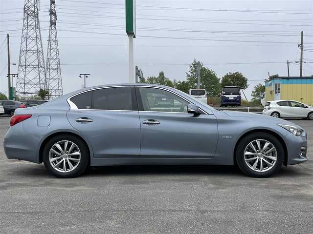 日産 スカイライン ハイブリッド 350GT FOUR Type P 道央・札幌 2014(平26)年 9.9万km ハガネブルーM ４WD/ワンオーナー/純正メーカーナビ/CD/DVD/BT/フルセグ/エマージェンシーブレーキ/横滑り防止装置/レーダークルーズコントロール/クリアランスソナー/アラウンドビューモニター/ビルトインETC/EVMODE/DRIVEMODE切替/前席パワーシート/前席シートヒーター/D席メモリーシート/レザーシート/革巻きステアリング/ステアリングリモコン/MTモード付AT/プッシュスタート/スマートキー/LEDヘッドライト/オートライト/フォグランプ/電動格納ミラー/ウィンカーミラー/純正フロアマット