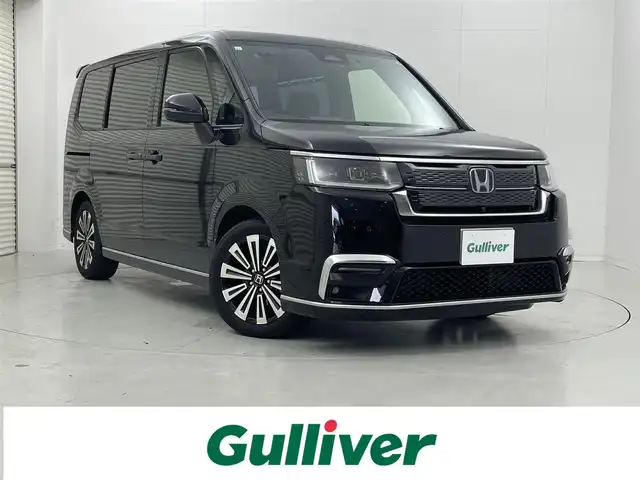 ホンダ ステップワゴン スパーダ eHEV プレミアムライン 茨城県 2023(令5)年 1.9万km クリスタルブラックパール 純正11.4型ナビ/全方位カメラ/フルセグ/純正15.6型フリップダウンモニター/フォグライトガーニッシュ/衝突被害軽減ブレーキ/車線逸脱抑制装置/レーダークルーズコントロール/オートマチックハイビーム/BSI/スソナー/両側電動スライドドア/アドバンスドルームミラー/ETC/ドラレコ/シートヒーター/純正17インチAW/LEDヘッドライト/スマートキー