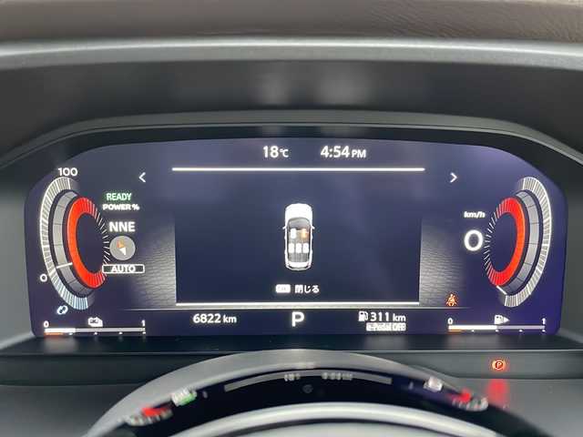 日産 エクストレイル G e－4ORCE 山形県 2023(令5)年 0.7万km シルバー／黒 カラーコード：XEW シェルブロンド / スーパーブラック 2トーン/禁煙車/プロパイロット/後側車両検知警報/衝突回避支援システム/踏み間違い衝突防止アシスト/前方衝突予測警報/横滑り防止装置/ふらつき警報/レーンキープアシスト/合皮シート/ディスプレイオーディオナビ（AM/FM/BT/USB/TV）/フルセグTV/オールアラウンドビューモニター/前後USB＆Type-C　挿込口　有/100V電源/ハンドルヒーター/デジタルインナーミラー/D/N席パワーシート/D席メモリシート/全席シートヒーター/木目調インストロア/本革巻ステアリング/パワーバックドア/ドライブレコーダー前後/コーナーセンサー前後/アダプティブLEDライト/LEDフォグ/ビルトインETC/オートホールド付電子パーキング/置くだけ充電/寒冷地仕様