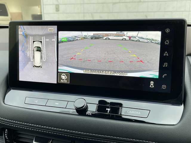 日産 エクストレイル G e－4ORCE 山形県 2023(令5)年 0.7万km シルバー／黒 カラーコード：XEW シェルブロンド / スーパーブラック 2トーン/禁煙車/プロパイロット/後側車両検知警報/衝突回避支援システム/踏み間違い衝突防止アシスト/前方衝突予測警報/横滑り防止装置/ふらつき警報/レーンキープアシスト/合皮シート/ディスプレイオーディオナビ（AM/FM/BT/USB/TV）/フルセグTV/オールアラウンドビューモニター/前後USB＆Type-C　挿込口　有/100V電源/ハンドルヒーター/デジタルインナーミラー/D/N席パワーシート/D席メモリシート/全席シートヒーター/木目調インストロア/本革巻ステアリング/パワーバックドア/ドライブレコーダー前後/コーナーセンサー前後/アダプティブLEDライト/LEDフォグ/ビルトインETC/オートホールド付電子パーキング/置くだけ充電/寒冷地仕様