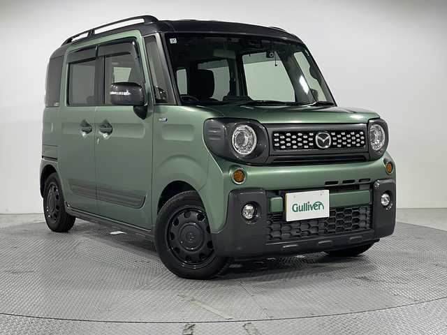 マツダ フレアワゴンタフスタイル ハイブリッドXS 広島県 2019(令1)年 4.3万km ツールグリーンパールメタリック/ガンメタリック 社外ナビ/両側パワースライドドア/ルーフレール/シートヒーター/バックカメラ/デュアルセンサーブレーキサポート/車線逸脱警報/ハイビームアシスト/誤発進抑制機能/LEDヘッドランプ/純正15インチホイールキャップ/ETC/ドライブレコーダー