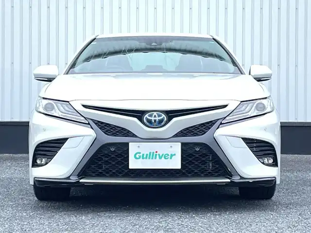 トヨタ カムリ WSレザーパッケージ 千葉県 2018(平30)年 2.1万km プラチナホワイトパールマイカ 純正9インチナビ/(フルセグTV/BT/FM/AM)/バックカメラ/ドライブレコーダー/ヘッドアップディスプレイ/ブラインドスポットモニター/衝突被害軽減システム/車線逸脱警報/レーダークルーズコントロール/レザーシート/横滑り防止装置/ビルトインETC/アイドリングストップ/LEDヘッドライト/フォグランプ/オートライト/ウィンカーミラー/電動格納ミラー/純正18インチAW/シートヒーター/シートリフター/プッシュスタート/スマートキー/フロアマット/スペアキー