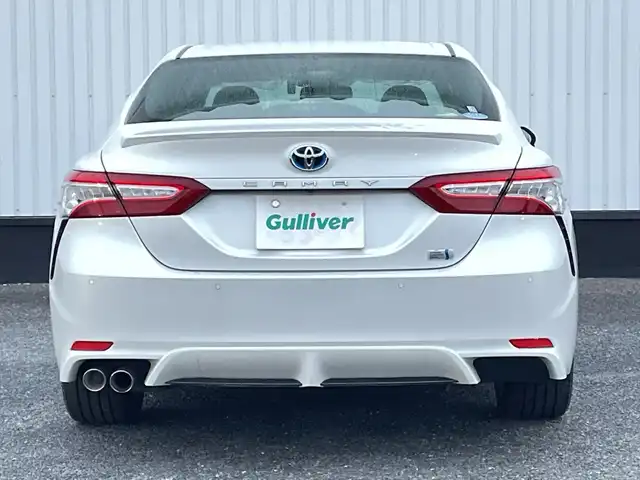 トヨタ カムリ WSレザーパッケージ 千葉県 2018(平30)年 2.1万km プラチナホワイトパールマイカ 純正9インチナビ/(フルセグTV/BT/FM/AM)/バックカメラ/ドライブレコーダー/ヘッドアップディスプレイ/ブラインドスポットモニター/衝突被害軽減システム/車線逸脱警報/レーダークルーズコントロール/レザーシート/横滑り防止装置/ビルトインETC/アイドリングストップ/LEDヘッドライト/フォグランプ/オートライト/ウィンカーミラー/電動格納ミラー/純正18インチAW/シートヒーター/シートリフター/プッシュスタート/スマートキー/フロアマット/スペアキー