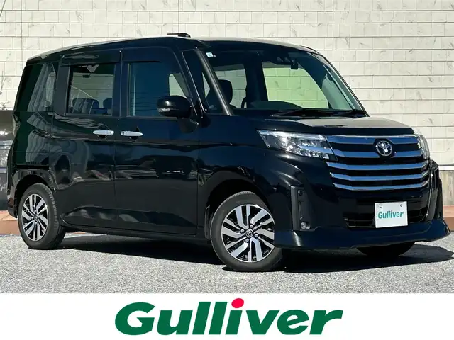 トヨタ ルーミー カスタムG 奈良県 2023(令5)年 4.6万km ブラックマイカメタリック 両側パワースライドドア/８インチ社外ナビ/（FM/AM/CD/DVD/フルセグ/Bluetooth/USB）/前後ドライブレコーダー/ETC/バックカメラ/スマートアシスト/・プリクラッシュブレーキアシスト	/・ブレーキ制御付誤発進抑制機能/・衝突警報機能/・レーンキープアシスト	/・アダプティブクルーズコントロール/・標識検知機能	/電動格納ミラー/電子パーキング/ブレーキホールド/アイドリングストップ/革巻きステアリング/ステアリングスイッチ/オートライト/LEDヘッドライト/フロントフォグ/フルオートエアコン/プッシュスタート/スマートキー/ドアバイザー