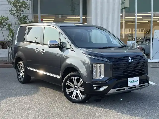 三菱 デリカＤ：５ P 石川県 2023(令5)年 3.1万km グラファイトグレーメタリック/ブラックマイカ 4WD/9型ナビ/フルセグTV/全方位カメラ/LEDヘッドライト/ETC/両側パワースライドドア/レーダークルーズ/レーダーブレーキ/ブラインドスポットモニター/スマートキー/プッシュスタート/シートヒーター/パワーバックドア/オートステップレス/保証書