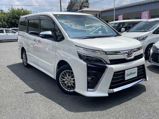トヨタ ヴォクシー ハイブリッド ZS 煌Ⅲ 埼玉県 2020(令2)年 6.9万km ホワイトパールクリスタルシャイン 両側パワースライドドア/ハーフレザーシート/スーパーUVカット機能付きガラス/デュアルオートエアコン/リアオートエアコン/ハイブリッドモデル/トヨタセーフティーセンス/純正ナビ/トラクションコントロール/Bi-Beam LEDヘッドランプ/LEDクリアランスランプ/フロントロアグリル/ナノイーエアコン/ETC/クルーズコントロール/ハーフレザーシート/シートクーラー/シートヒーター/純正ナビ/スペアキー/バックカメラ