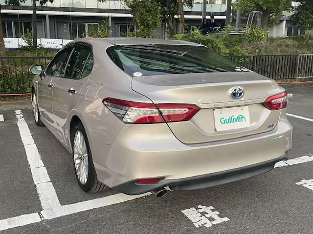 トヨタ カムリ 宮城県 2017(平29)年 1.7万km スティールブロンドM トヨタセーフティーセンス/・プリクラッシュセーフティ/・オートマチックハイビーム/・レーダークルーズコントロール/・ブラインドスポットモニター/・先行車発信アラート/・リヤクロストラフィックアラート/・後退時車両検知警報/・クリアランスソナー/純正ナビ/・フルセグTV/Bluetooth/USB/・ETC/・ドライブレコーダー/ヘッドアップディスプレイ/電子パーキング/・オートホールド/ステアリングスイッチ/レザーシート/・シートヒーター（運転席・助手席）/・パワーシート（運転席・助手席）/LEDヘッドライト/・オートライト/・オートマッチクハイビーム/・フォグランプ/アイドリングストップ/・プッシュスタート/・スマートキー/純正フロアマット/純正18インチアルミホイール/電動格納ミラー/ドアバイザー