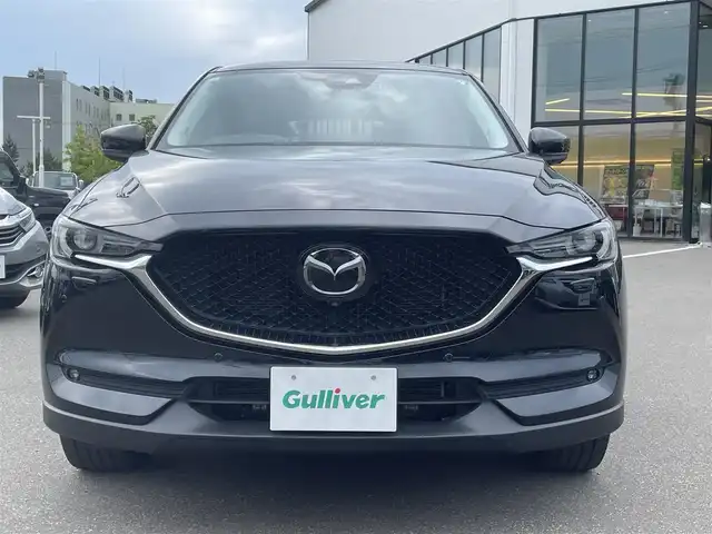 マツダ ＣＸ－５ 25S ブラックトーンED 青森県 2021(令3)年 2.9万km ジェットブラックマイカ ・4WD/・10インチ純正ディスプレイナビ/　(Bt/USB/フルセグTV)/・全方位カメラ/・ヘットアップディスプレイ/・アダプティブクルーズコントロール/・レーンキープアシスト/・衝突軽減ブレーキ/・車間認識支援/・車線逸脱抑制機能/・ブラインドスポットモニター/・パーキングアシスト/・アイドリングストップ/・ヒルスタートアシスト/・パワーバックドア/・黒ハーフレザーシート/・D席パワーシート/・前席シートヒーター/・ステアリングスイッチ/・ステアリングヒーター/・ETC/・LEDヘッドライト/フォグ/・オートライト/・フロントフォグランプ/・電動格納ミラー/・ウィンカーミラー/・電動パーキング/・オートホールドブレーキ/・純正19インチアルミホイール/・純正フロアマット/・前後ドラレコ/・前後バンパーソナー/・リア5面プライバシーガラス/・W/サイド/カーテンエアバッグ /・プッシュスタート/・ABS/・スマートキー/・保証書/取説/ナビ取説/・社外アルミホイール＋冬タイヤ積込