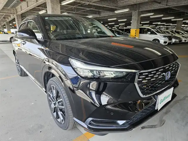 ホンダ ヴェゼル ハイブリッド e:HEV Z 福岡県 2021(令3)年 7.4万km クリスタルブラックパール ワンオーナー/純正9型ナビ(BT/AM/FM)/フルセグTV/ハンズフリーパワーバックドア/バックカメラ/ドライブレコーダー/渋滞追従機能付アダプティブクルーズコントロール/ソナーセンサー/ホンダセンシング/・衝突軽減ブレーキ/・誤発進抑制機能(前後)/・近距離衝突軽減ブレーキ/・歩行者事故軽減ステアリング/・車線維持支援システム/・先行車発進お知らせ機能/・標識認識機能/・オートハイビーム/フルLEDヘッドランプ(オートレベリング機構)/本革巻きステアリング/ステアリングヒーター/パドルシフト/合皮/ファブリックコンビシート/前席シートヒーター/純正18インチアルミホイール/スマートキー/禁煙車