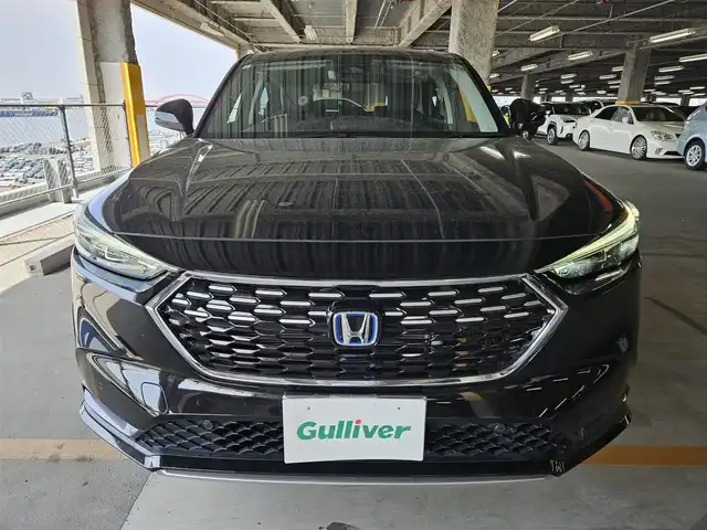 ホンダ ヴェゼル ハイブリッド e:HEV Z 福岡県 2021(令3)年 7.4万km クリスタルブラックパール ワンオーナー/純正9型ナビ(BT/AM/FM)/フルセグTV/ハンズフリーパワーバックドア/バックカメラ/ドライブレコーダー/渋滞追従機能付アダプティブクルーズコントロール/ソナーセンサー/ホンダセンシング/・衝突軽減ブレーキ/・誤発進抑制機能(前後)/・近距離衝突軽減ブレーキ/・歩行者事故軽減ステアリング/・車線維持支援システム/・先行車発進お知らせ機能/・標識認識機能/・オートハイビーム/フルLEDヘッドランプ(オートレベリング機構)/本革巻きステアリング/ステアリングヒーター/パドルシフト/合皮/ファブリックコンビシート/前席シートヒーター/純正18インチアルミホイール/スマートキー/禁煙車