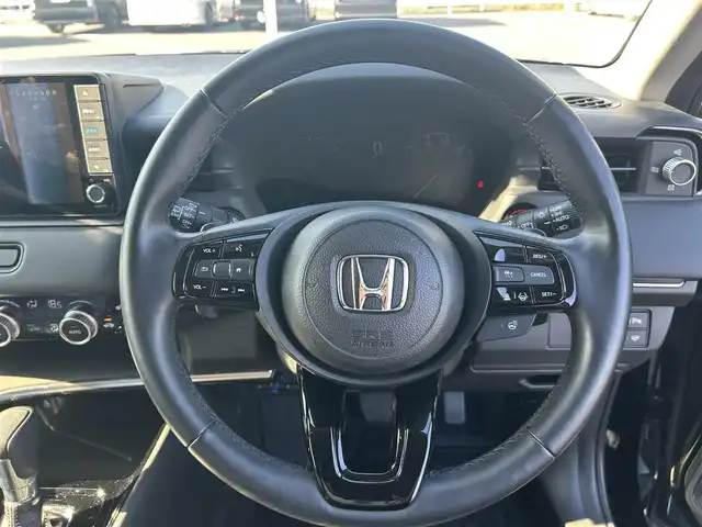 ホンダ ヴェゼル ハイブリッド e:HEV Z 岡山県 2021(令3)年 7.4万km クリスタルブラックパール 純正9型ナビ(BT/AM/FM)/フルセグTV/ハンズフリーパワーバックドア/バックカメラ/前後ドライブレコーダー/渋滞追従機能付アダプティブクルーズコントロール/ソナーセンサー/ホンダセンシング/・衝突軽減ブレーキ/・誤発進抑制機能(前後)/・近距離衝突軽減ブレーキ/・歩行者事故軽減ステアリング/・車線維持支援システム/・先行車発進お知らせ機能/・標識認識機能/・オートハイビーム/フルLEDヘッドランプ(オートレベリング機構)/本革巻きステアリング/ステアリングヒーター/パドルシフト/合皮/ファブリックコンビシート/前席シートヒーター/純正18インチアルミホイール/スマートキー