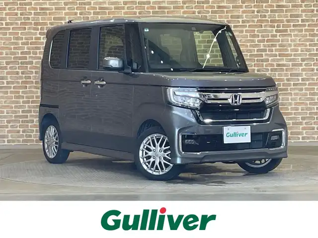 ホンダ Ｎ ＢＯＸ カスタム L ターボ 岩手県 2021(令3)年 4万km シャイニンググレーM ４WD/ターボ/両側パワースライドドア/ホンダセンシング/衝突軽減ブレーキ/アダプティブクルーズコントロール/レーンキープアシスト/オートハイビーム/誤発進抑制機能/パーキングセンサーシステム/横滑り防止装置/アイドリングストップ/パドルシフト/純正ナビ/フルセグTV/バックカメラ/ETC/ドライブレコーダー/LEDヘッドライト/純正アルミホイール