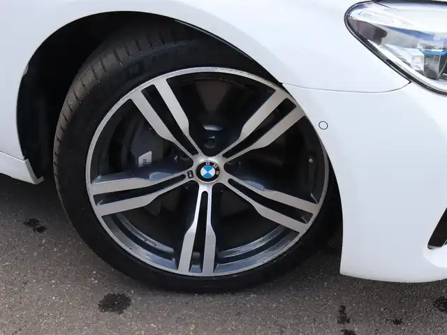ＢＭＷ ７５０Ｌｉ Mスポーツ 宮城県 2017(平29)年 6.4万km 白 純正ナビ【ＢＴ／ＣＤ／ＤＶＤ／フルセグＴＶ】/ヘッドアップディスプレイ/サンルーフ　/リアエンターモニター　/Ｈａｒｍａｎ　Ｋａｒｄｏｎサウンド　/インテリジェントセーフティ/エアサスペンション/アンビエントライト　/パドルシフト　/全席メモリー付きパワーシート/アダプティブクルーズコントロール/全席シートヒーター/エアシート/イージークローザー/ドライブレコーダー/パワートランク/パーキングアシスト/純正20インチAW/360°カメラ/黒レザーシート/LEDヘッドライト/コンフォートアクセス/ミラー一体型ETC/禁煙車
