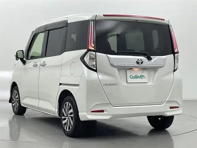 トヨタ ルーミー カスタムG 熊本県 2023(令5)年 1.1万km パールホワイトⅢ 純正9インチディスプレイオーディオ（ＡｐｐｌＣａｒＰｌａｙ・ＡｎｄｒｏｉｄＡｕｔｏ・ＢＴ・フルセグ・ＵＳＢ）/TVキャンセラー/全周囲カメラ　/社外前後ドライブレコーダー　/ビルトインＥＴＣ２．０　/両側パワースライドドア/スマートアシスト/・衝突軽減ブレーキ/・アダブティブクルーズコントロール/・先行車発進お知らせ機能/・レーンキープアシスト/・前後誤発進抑制機能/・標識認識システム/横滑り防止/アイドリングストップ/前後クリアランスソナー　/電動パーキングサポート/ブレーキホールド/純正フロアマット/純正１４インチAW/オートライト/オートマチックハイビーム/LEDヘッドライト/フォグランプ/スマートキー/プッシュスタート/スペアキー1本/保証書/取扱説明書