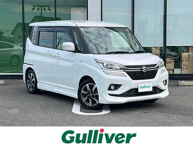 スズキ ソリオ バンディット HV MV 岐阜県 2019(平31)年 3万km ピュアホワイトP 登録時走行距離29609km/純正ナビ/フルセグテレビ/シートヒーター/クルーズコントロール/両側パワースライドドア/ETC/純正アルミホイール/Bluetooth接続/スマートキー/LEDヘッドライト/エアバッグ/オートライト/ドライブレコーダー/プッシュスタート/オートマッチックハイビーム/レーンキープアシスト/純正フロアマット
