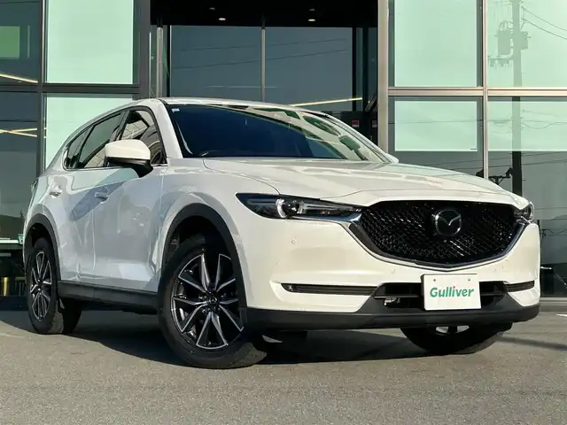 マツダ ＣＸ－５ 25S Lパッケージ 愛媛県 2021(令3)年 2.4万km スノーフレイクホワイトパールマイカ 純正SDナビ（Bluetooth/フルセグTV）/BOSEサウンド/全周囲カメラ/ヘッドアップディスプレイ/ブラックレザーシート/全席シートヒーター/パワーシート/D席シートメモリ機能/ステアリングリモコン/ステアリングヒーター/ETC2.0/ドライブレコーダー/前後コーナーセンサー/LEDヘッドライト