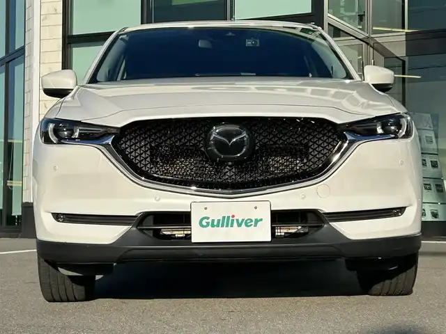 マツダ ＣＸ－５ 25S Lパッケージ 愛媛県 2021(令3)年 2.4万km スノーフレイクホワイトパールマイカ 純正SDナビ（Bluetooth/フルセグTV）/BOSEサウンド/全周囲カメラ/ヘッドアップディスプレイ/ブラックレザーシート/全席シートヒーター/パワーシート/D席シートメモリ機能/ステアリングリモコン/ステアリングヒーター/ETC2.0/ドライブレコーダー/前後コーナーセンサー/LEDヘッドライト