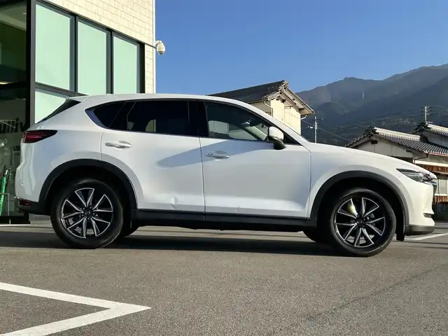 マツダ ＣＸ－５ 25S Lパッケージ 愛媛県 2021(令3)年 2.4万km スノーフレイクホワイトパールマイカ 純正SDナビ（Bluetooth/フルセグTV）/BOSEサウンド/全周囲カメラ/ヘッドアップディスプレイ/ブラックレザーシート/全席シートヒーター/パワーシート/D席シートメモリ機能/ステアリングリモコン/ステアリングヒーター/ETC2.0/ドライブレコーダー/前後コーナーセンサー/LEDヘッドライト