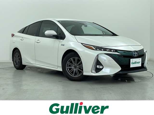 トヨタ プリウス ＰＨＶ S セーフティプラス 宮城県 2019(平31)年 5.7万km ホワイトパールクリスタルシャイン Toyota Safety Sense 	/・プリクラッシュセーフティ	/・レーンディパーチャーアラート	/・オートマチックハイビーム	/・レーダークルーズコントロール	/・クリアランスソナー/純正9型ナビ/・BT.CD.DVD.SD/フルセグTV/バックカメラ/パーキングアシスト/LEDヘッドライト/LEDフォグランプ/ビルトインETC2.0/社外ドライブレコーダー（F）/アイドリングストップ/横滑り防止装置/プッシュスタート/スマートキー/純正15inAW付（冬タイヤ積込）/社外15inAW/純正フロアマット