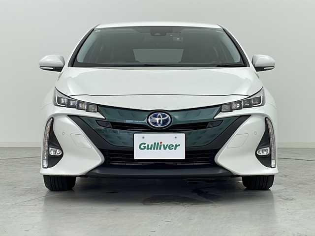 トヨタ プリウス ＰＨＶ S セーフティプラス 宮城県 2019(平31)年 5.7万km ホワイトパールクリスタルシャイン Toyota Safety Sense 	/・プリクラッシュセーフティ	/・レーンディパーチャーアラート	/・オートマチックハイビーム	/・レーダークルーズコントロール	/・クリアランスソナー/純正9型ナビ/・BT.CD.DVD.SD/フルセグTV/バックカメラ/パーキングアシスト/LEDヘッドライト/LEDフォグランプ/ビルトインETC2.0/社外ドライブレコーダー（F）/アイドリングストップ/横滑り防止装置/プッシュスタート/スマートキー/純正15inAW付（冬タイヤ積込）/社外15inAW/純正フロアマット