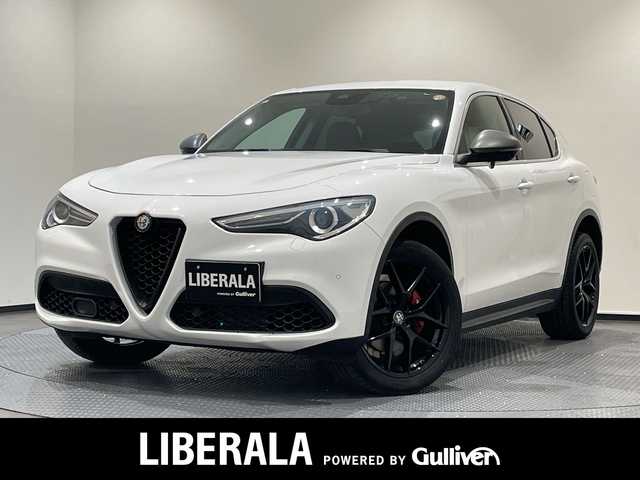 アルファロメオ ステルヴィオ ファーストエディション 新潟県 2018(平30)年 4.7万km 白 FastEdition４００台限定/・harman/kardonプレミアムサウンドシステム/・プレミアムレザーシート（チョコレート）/・グレイオークウッドインテリア/・レッドキャリパー/・FastEdition専用２０インチAW/・アルファ ホワイト（ボディーカラー）/標準装備/・アダプティブクルーズコントロール/・レーンキピングアシスト/・ブラインドスポットモニター/・コーナーセンサー/・バックカメラ/・ミラーヒーター/・パワーシート/・シートヒーター/・ステアリングヒーター/・パワーテールゲート/・Bluetooth/・AppleCarPlay/・ETC