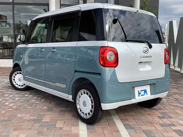 ダイハツ ムーヴ キャンバス ストライプス G 三重県 2023(令5)年 0.7万km シャイニングホワイトパール/レイクブルーメタリック スマートアシスト/カロッツエリアディスプレイオーディオ/Bluetooth/バックカメラ/予約機能付き両側パワースライドドア/シートヒーター/LEDヘッドライト/LEDフォグライト/スマートキー/プッシュスタート/ドライブレコーダー