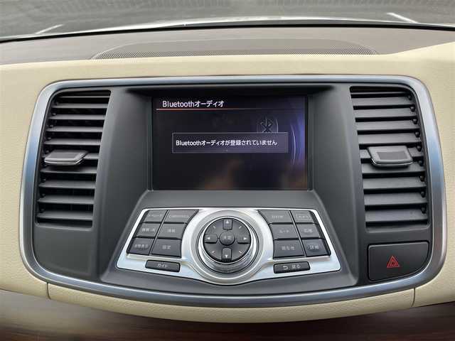日産 ティアナ 250XV 栃木県 2012(平24)年 11.1万km ホワイトパール 純正メモリナビ/[ワンセグ/AM/FM/CD/DVD/BT/AUX]/バックカメラ/ETC/前席パワーシート/D席メモリーシート/前席シートヒーター/前席エアシート/N席オットマン/コーナーセンサー/本革レザーシート(ベージュ)/RAYS19インチアルミ/ダウンサス/平面ハーフミラータイプGPSレーダー探知機/オートライト/HIDヘッドライト/フォグランプ/ステアスイッチ/プッシュスタート/純正マット/電格ミラー/保証書/取扱説明書