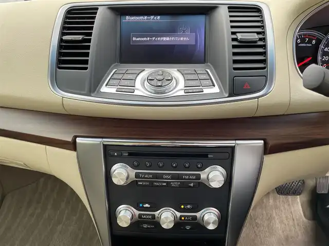 日産 ティアナ 250XV 栃木県 2012(平24)年 11.1万km ホワイトパール 純正メモリナビ/[ワンセグ/AM/FM/CD/DVD/BT/AUX]/バックカメラ/ETC/前席パワーシート/D席メモリーシート/前席シートヒーター/前席エアシート/N席オットマン/コーナーセンサー/本革レザーシート(ベージュ)/RAYS19インチアルミ/ダウンサス/平面ハーフミラータイプGPSレーダー探知機/オートライト/HIDヘッドライト/フォグランプ/ステアスイッチ/プッシュスタート/純正マット/電格ミラー/保証書/取扱説明書