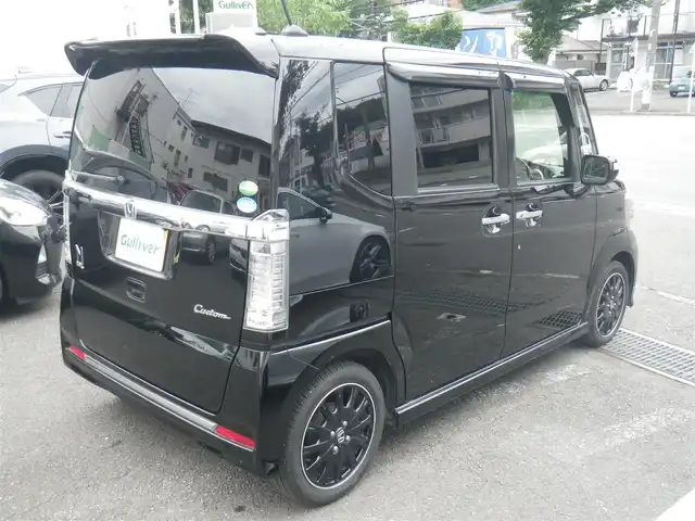 ホンダ Ｎ ＢＯＸ 神奈川県 2017(平29)年 9.1万km クリスタルブラックパール ターボ/シティブレーキアクティブシステム/純正8インチナビ　フルセグTV/（DVD再生可/Bluetooth/VTR/SD/Mラック）/バックカメラ/オートクルーズコントロール/両側パワースライドドア/専用15インチホイール/ハーフレザーシート/前席シートヒーター/キセノンヘッドランプ/LEDフォグランプ/ビルトインETC/ロールサンシェード/アイドリングストップ/パドルシフト/スマートキーx2/取説書/保証書