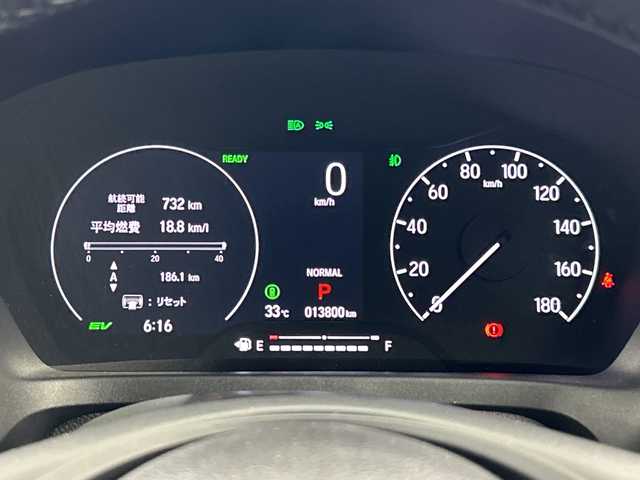 ホンダ ヴェゼル ハイブリッド e:HEV Z 愛知県 2024(令6)年 1.4万km プラチナホワイトパール 禁煙車/ワンオーナー/純正9インチナビ/（AM/FM/Bluetooth/フルセグTV）/バックカメラ/ワイヤレス充電/ホンダセンシング/・衝突軽減ブレーキ/・先行車発信お知らせ機能/・アダプティブクルーズコントロール/・ブラインドスポットモニター/・オートマチックハイビーム/前後コーナーセンサー/ETC2.0/シートヒーター/ハーフレザーシート/パドルシフト/ステアリングヒーター/パワーバックドア/スマートキー/スペアキー有/純正アルミホイール