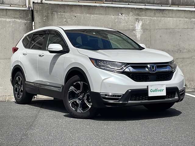 ホンダ ＣＲ－Ｖ ハイブリッド e:HEV EX 愛知県 2022(令4)年 0.7万km プラチナホワイトパール ワンオーナー/純正SDナビ/フルセグTV・Bluetooth・CD・DVD・USB/バックカメラ/ホンダセンシング/・CMBS/・ACC/・先行車発進お知らせ/・路外逸脱抑制/・レーンキープアシスト/・BSM/・標識認識機能/パドルシフト/クリアランスソナー/前席シートヒーター/D席メモリ機能付きパワーシート/ステアリングヒーター/ハーフレザーシート（黒）/純正前後ドライブレコーダー/LEDヘッドライト/フォグライト/シーケンシャルターンシグナルライト/オートライト/オートハイビーム/ビルトインETC/純正フロアマット/純正ドアバイザー/保証書/ディーラー点検記録簿(1ヶ月・6ヶ月・R4・R5・R6)/取扱説明書/スマートスペアキー