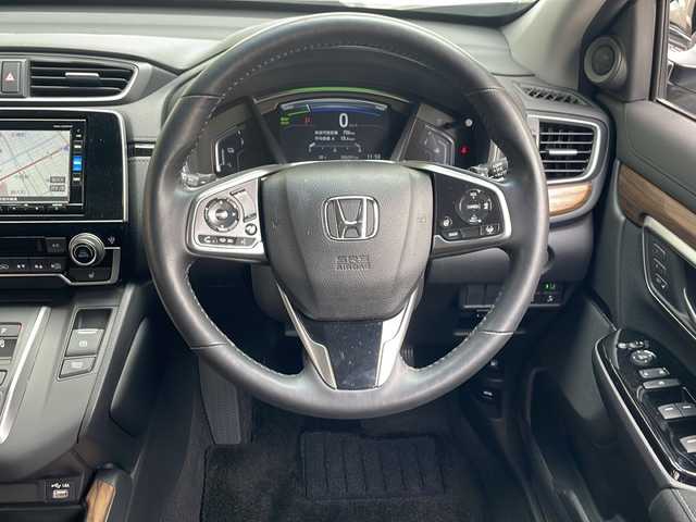 ホンダ ＣＲ－Ｖ ハイブリッド e:HEV EX 愛知県 2022(令4)年 0.7万km プラチナホワイトパール ワンオーナー/純正SDナビ/フルセグTV・Bluetooth・CD・DVD・USB/バックカメラ/ホンダセンシング/・CMBS/・ACC/・先行車発進お知らせ/・路外逸脱抑制/・レーンキープアシスト/・BSM/・標識認識機能/パドルシフト/クリアランスソナー/前席シートヒーター/D席メモリ機能付きパワーシート/ステアリングヒーター/ハーフレザーシート（黒）/純正前後ドライブレコーダー/LEDヘッドライト/フォグライト/シーケンシャルターンシグナルライト/オートライト/オートハイビーム/ビルトインETC/純正フロアマット/純正ドアバイザー/保証書/ディーラー点検記録簿(1ヶ月・6ヶ月・R4・R5・R6)/取扱説明書/スマートスペアキー